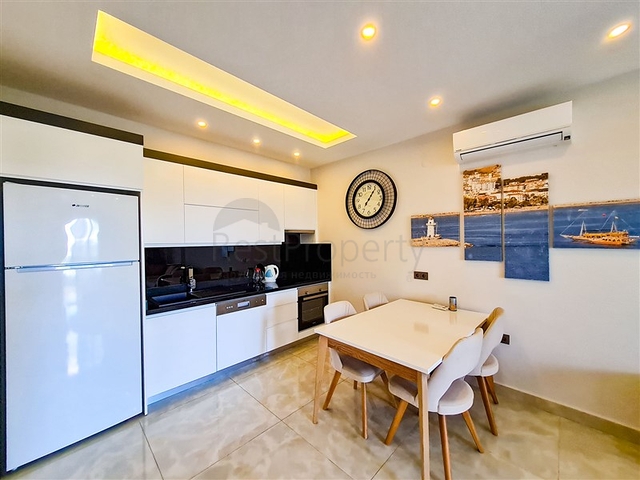 Квартира 1+1 на первой линии в районе Махмутлар 