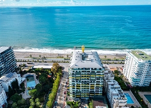 Квартира 1+1 на первой линии в районе Махмутлар 