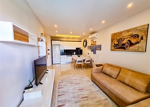 Квартира 1+1 на первой линии в районе Махмутлар 