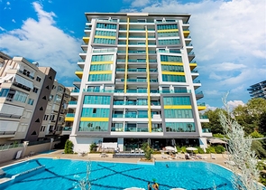 Квартира 1+1 на первой линии в районе Махмутлар 