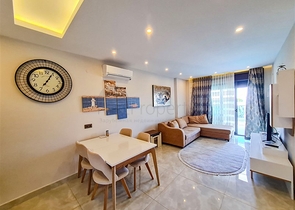 Квартира 1+1 на первой линии в районе Махмутлар 