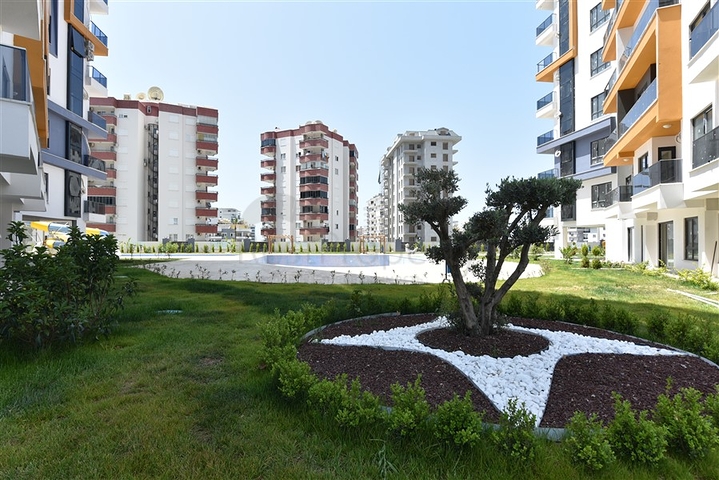 Апартаменты 1+1 в современном комплексе на побережье Средиземного моря  