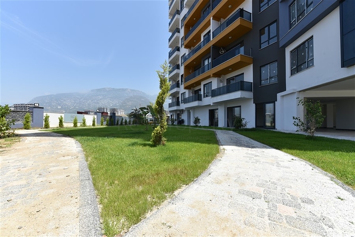 Апартаменты 1+1 в современном комплексе на побережье Средиземного моря  