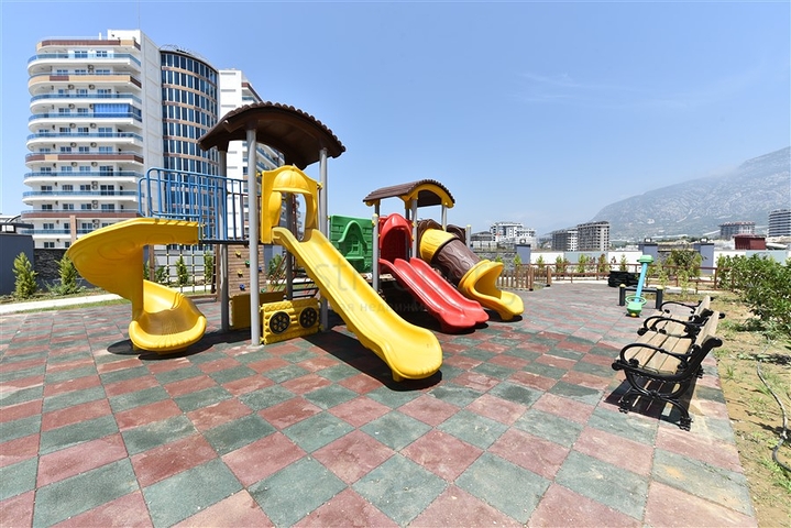 Апартаменты 1+1 в современном комплексе на побережье Средиземного моря  