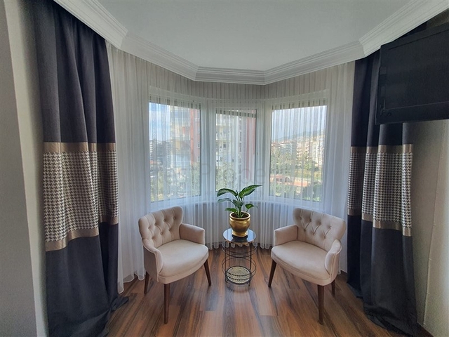 Большая квартира в комплексе с отельной инфраструктурой в центральном районе Джикджилли.