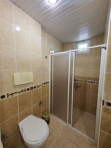 Большая квартира в комплексе с отельной инфраструктурой в центральном районе Джикджилли.