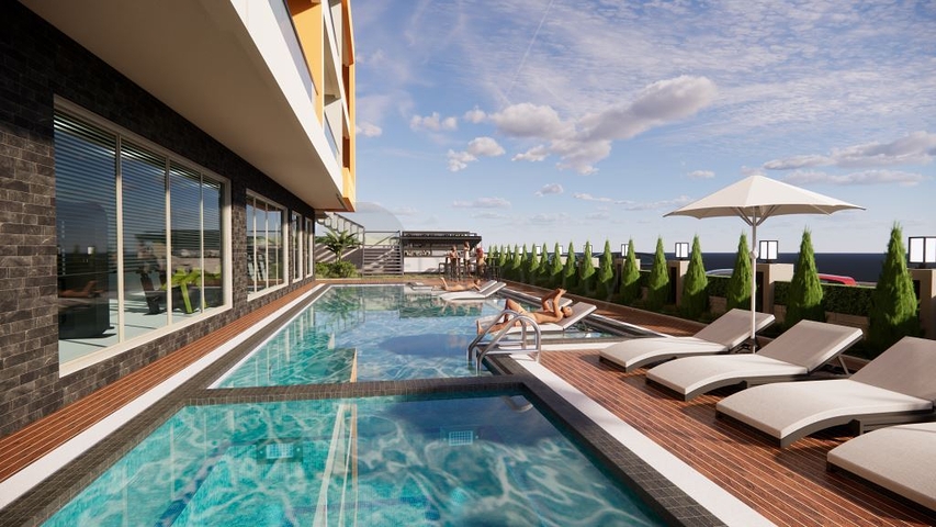 Квартира 1+1 в одном из новых комплексов района Махмутлар