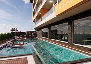 Квартира 1+1 в одном из новых комплексов района Махмутлар