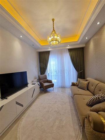 Двухкомнатная квартира в районе Махмутлар