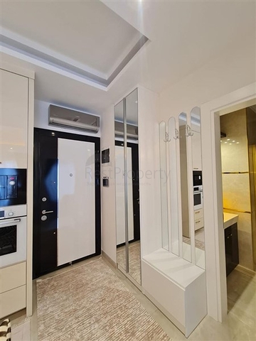 Двухкомнатная квартира в районе Махмутлар