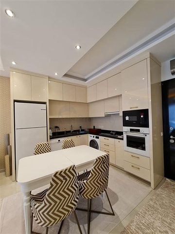 Двухкомнатная квартира в районе Махмутлар