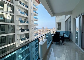 Двухкомнатная квартира в районе Махмутлар