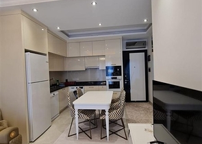 Двухкомнатная квартира в районе Махмутлар