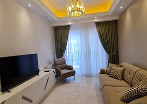 Двухкомнатная квартира в районе Махмутлар