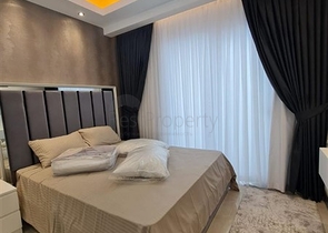 Двухкомнатная квартира в районе Махмутлар