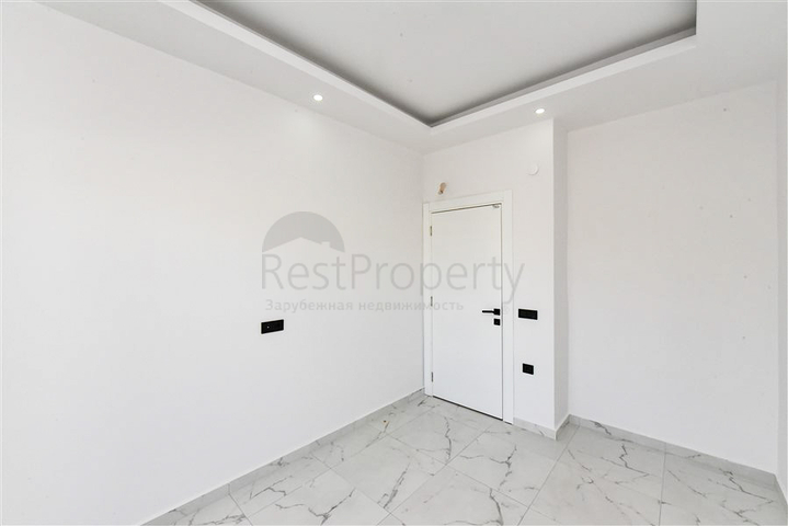 Квартира 1+1 в районе Конаклы в строящемся комплексе