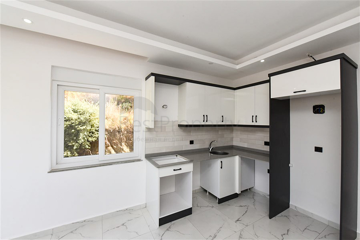 Квартира 1+1 в районе Конаклы в строящемся комплексе