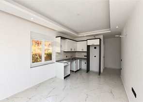 Квартира 1+1 в районе Конаклы в строящемся комплексе