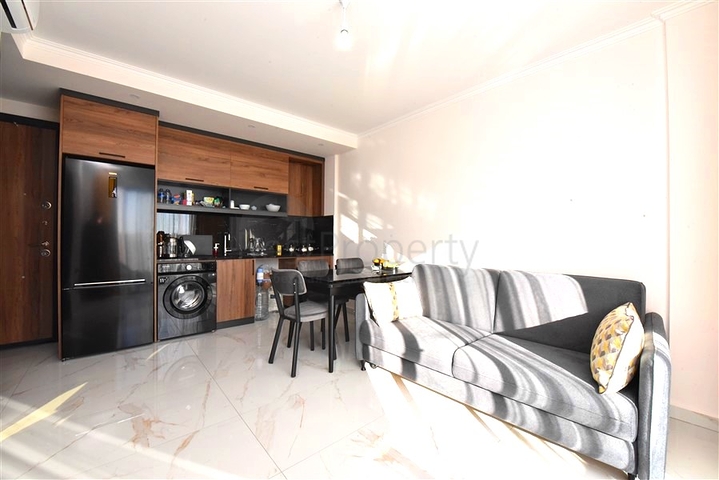 Уютная квартира 1+1 в комплексе с разнообразной инфраструктурой в районе Оба