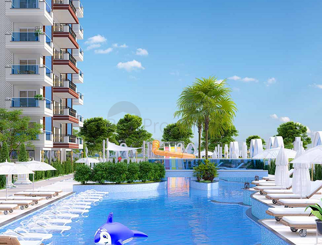 Квартира в новом доме в районе Махмутлар.