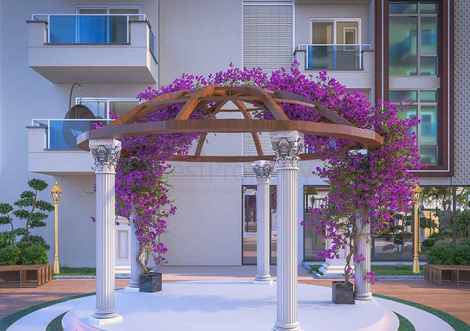 Квартира в новом доме в районе Махмутлар.