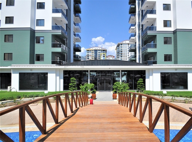 Большая квартира в аренду в комплексе с отельной инфраструктурой в районе Махмутлар! 