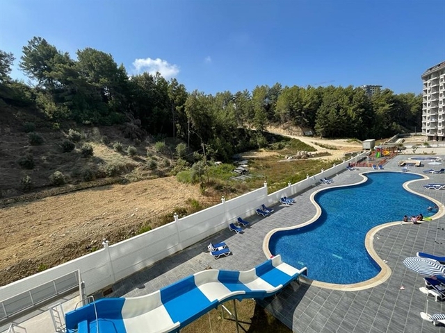 Новая квартира 1+1 в окружении соснового леса в комплексе с богатой инфраструктурой