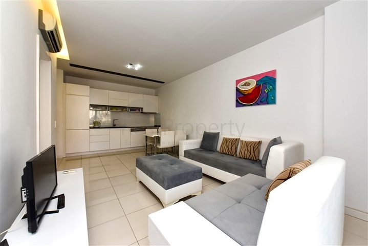 Квартира 1+1 популярном районе Оба в 100 метрах от моря