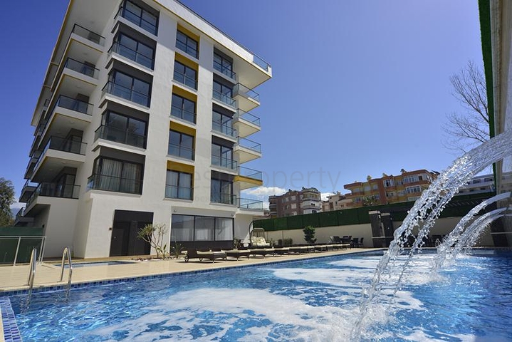 Квартира 1+1 популярном районе Оба в 100 метрах от моря