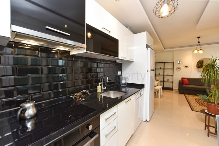 Студия в комплексе отельного типа в Авсалларе