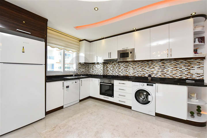 Квартира планировкой 2+1 в районе Махмутлар 