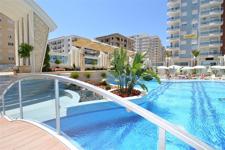 Квартира планировкой 2+1 в районе Махмутлар 