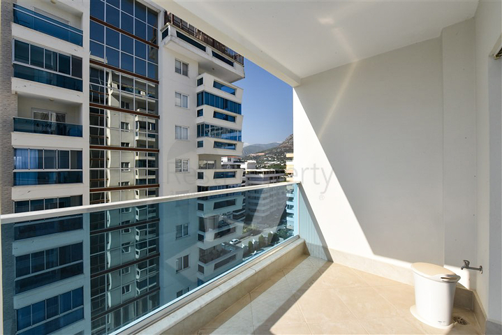 Квартира планировкой 2+1 в районе Махмутлар 