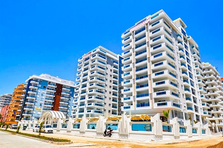 Квартира планировкой 2+1 в районе Махмутлар 