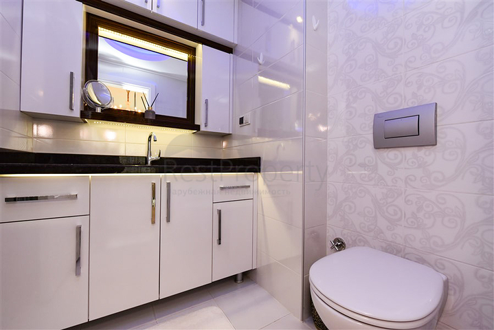 Квартира планировкой 2+1 в районе Махмутлар 