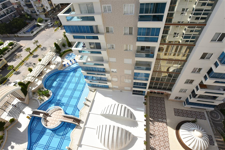 Квартира планировкой 2+1 в районе Махмутлар 