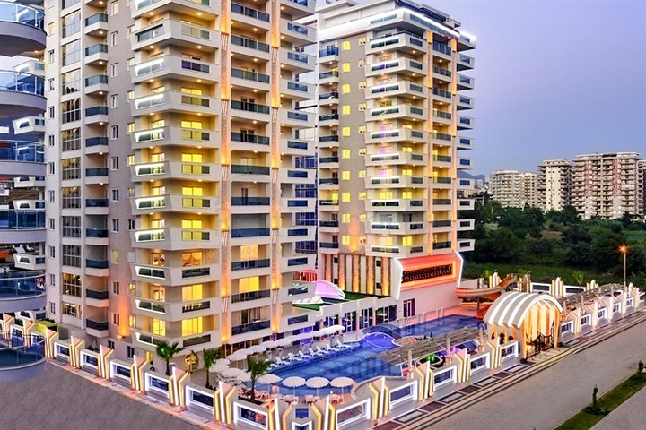 Квартира планировкой 2+1 в районе Махмутлар 