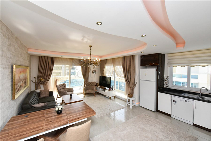 Квартира планировкой 2+1 в районе Махмутлар 