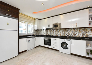 Квартира планировкой 2+1 в районе Махмутлар 