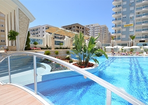 Квартира планировкой 2+1 в районе Махмутлар 