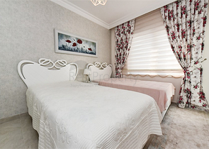 Квартира планировкой 2+1 в районе Махмутлар 