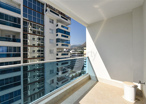 Квартира планировкой 2+1 в районе Махмутлар 