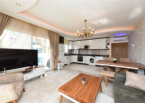 Квартира планировкой 2+1 в районе Махмутлар 