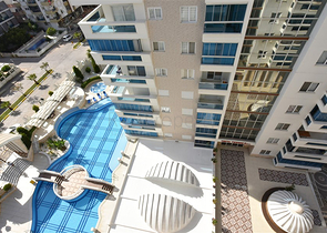 Квартира планировкой 2+1 в районе Махмутлар 