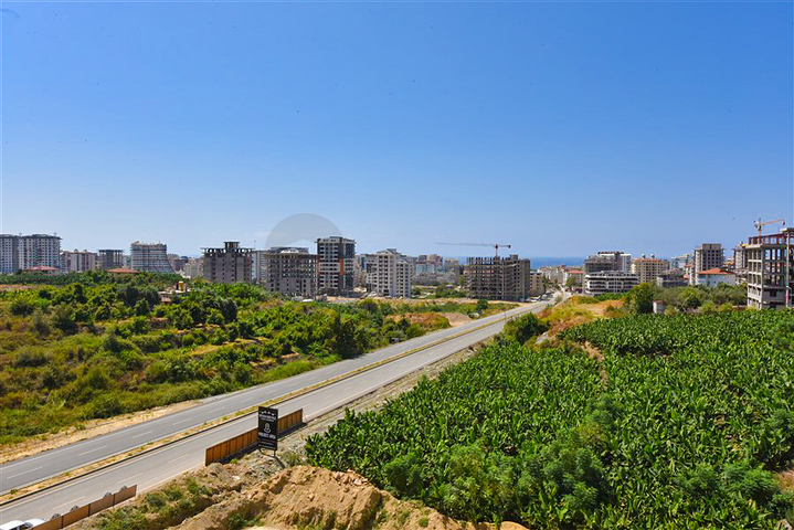 Квартира 1+1 в новом доме в районе Махмутлар