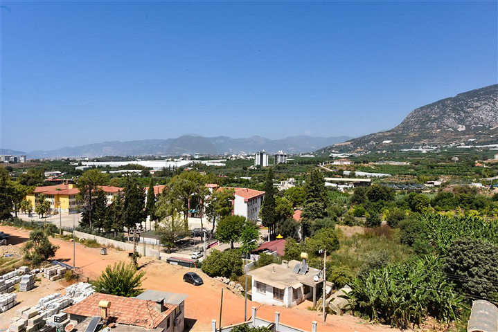 Квартира 1+1 в новом доме в районе Махмутлар