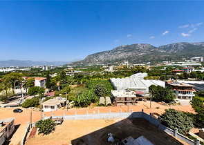 Квартира 1+1 в новом доме в районе Махмутлар