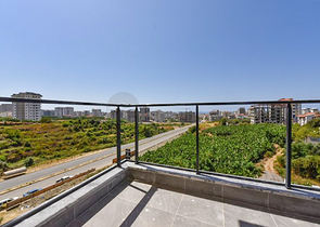 Квартира 1+1 в новом доме в районе Махмутлар