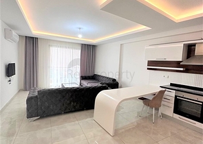 Квартира 1+1 в районе Махмутлар 