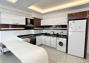 Квартира 1+1 в районе Махмутлар 